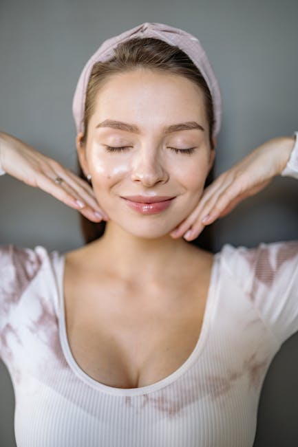 Portrait photo of a smiling woman who feels refreshed after yoga.